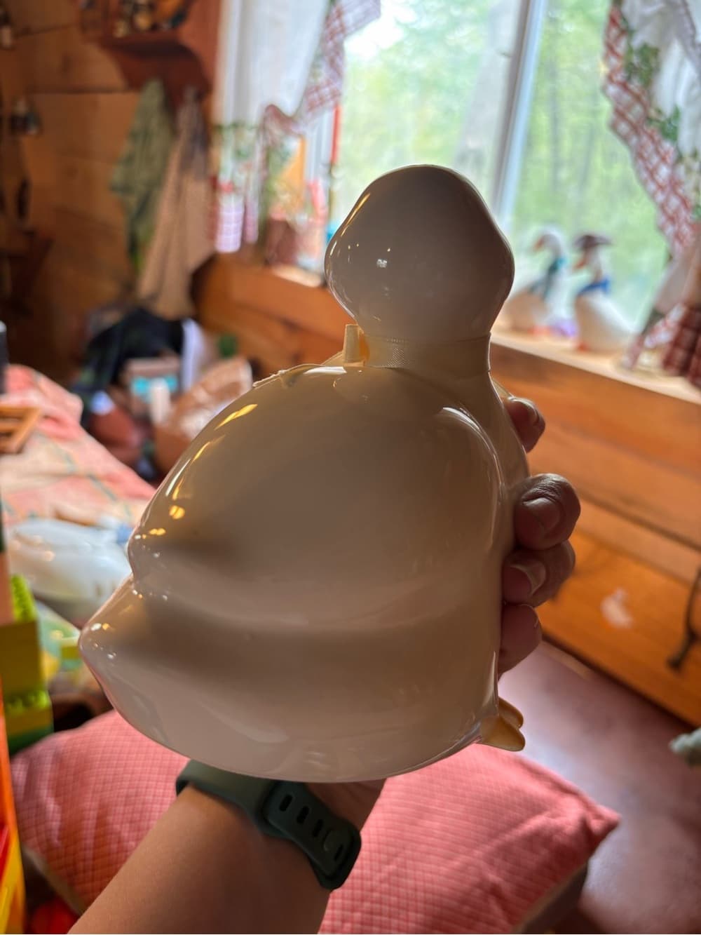 White Ceramic Duck Figurine with Yellow Beak and Feet