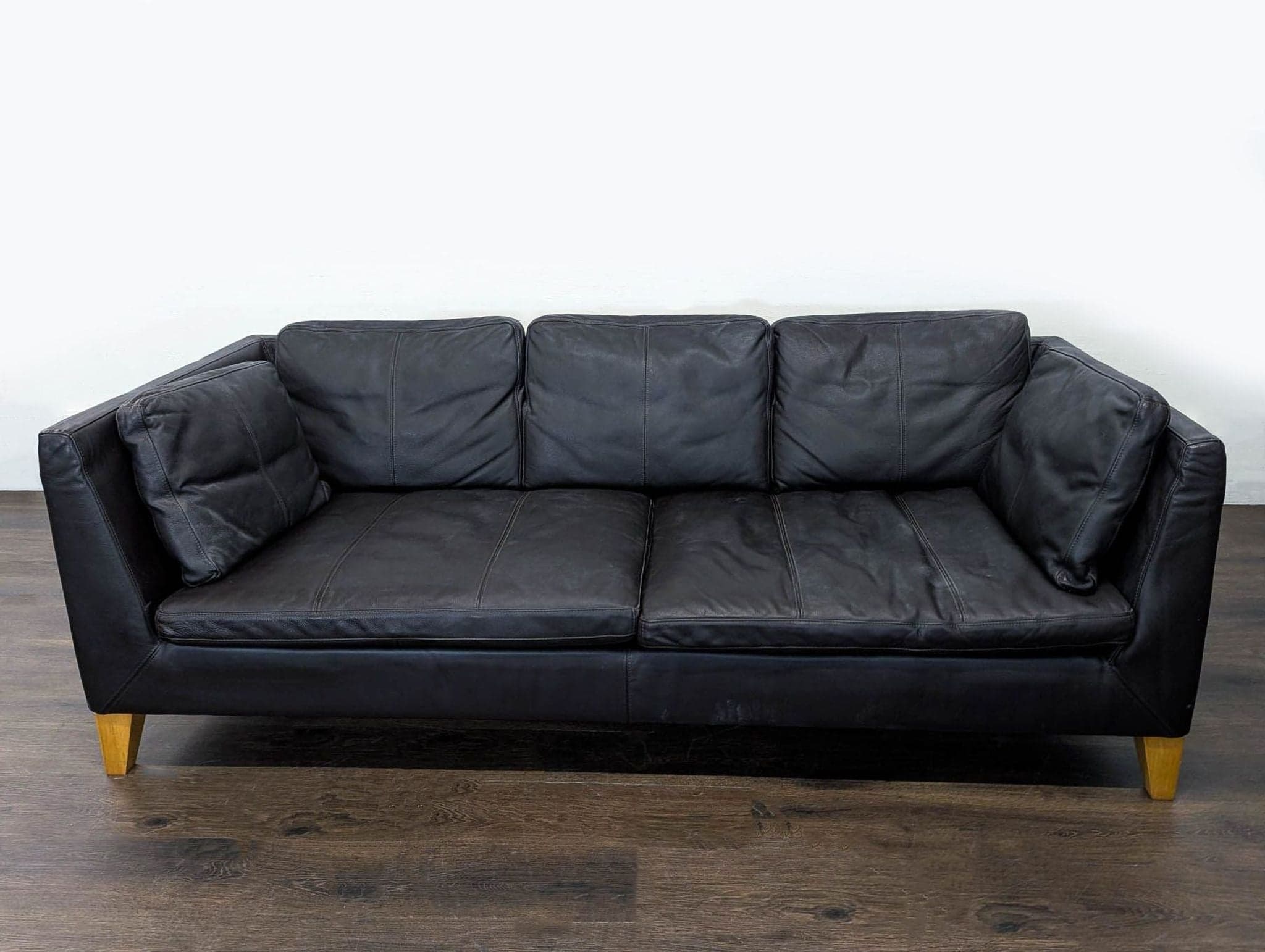 Ikea 3-Seat Dark Leather Sofa with Wooden Legs