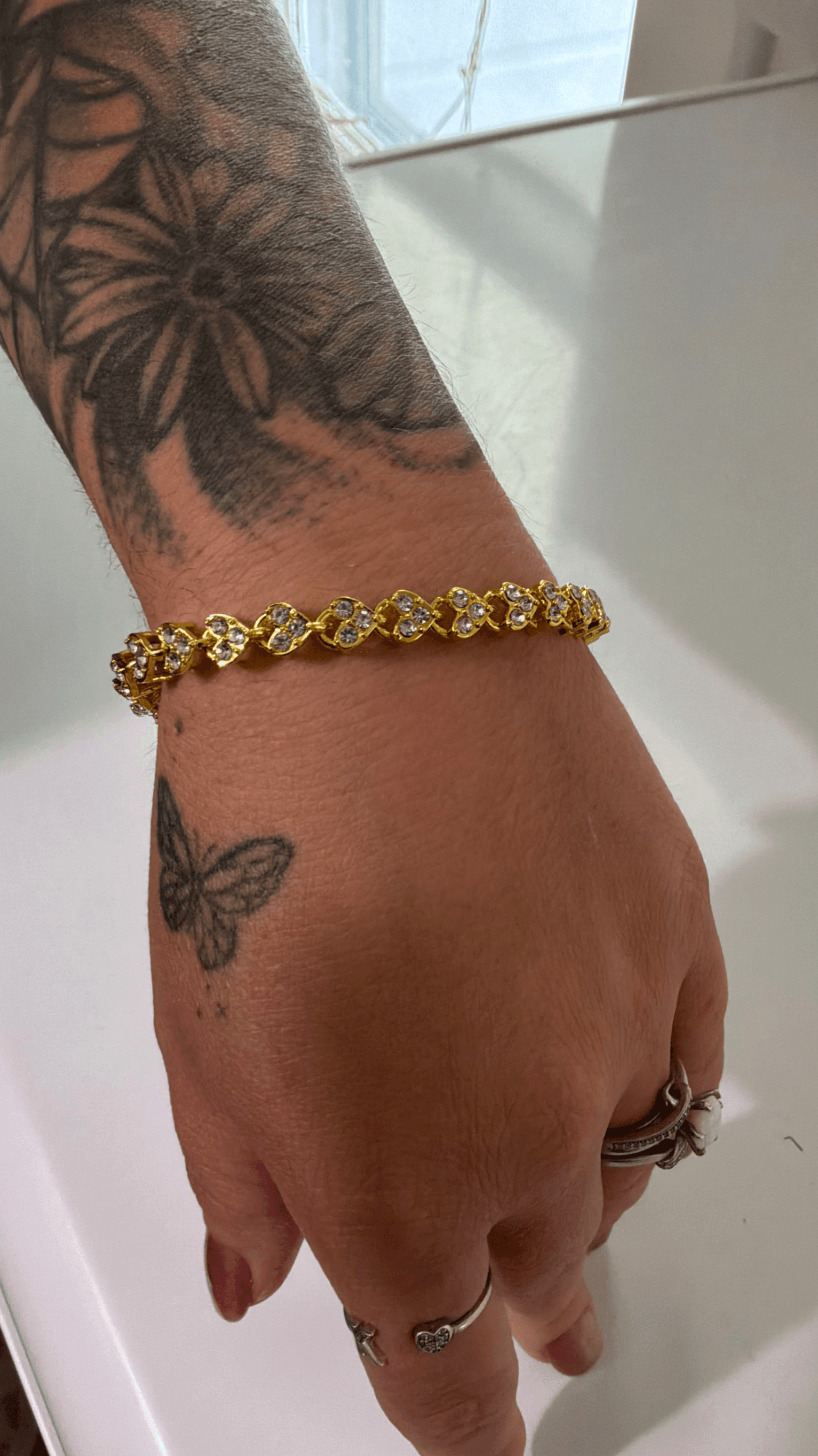 Gold-Tone Heart Link Bracelet with Clear Stones