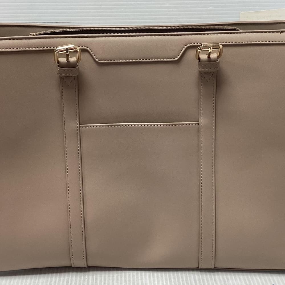 This is a Lucasech beige faux leather tote/laptop bag featuring an adjustable st