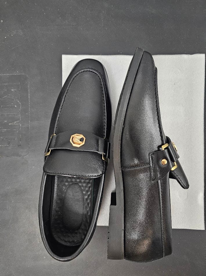 Black Leather Loafers with Gold Buckle Detail
