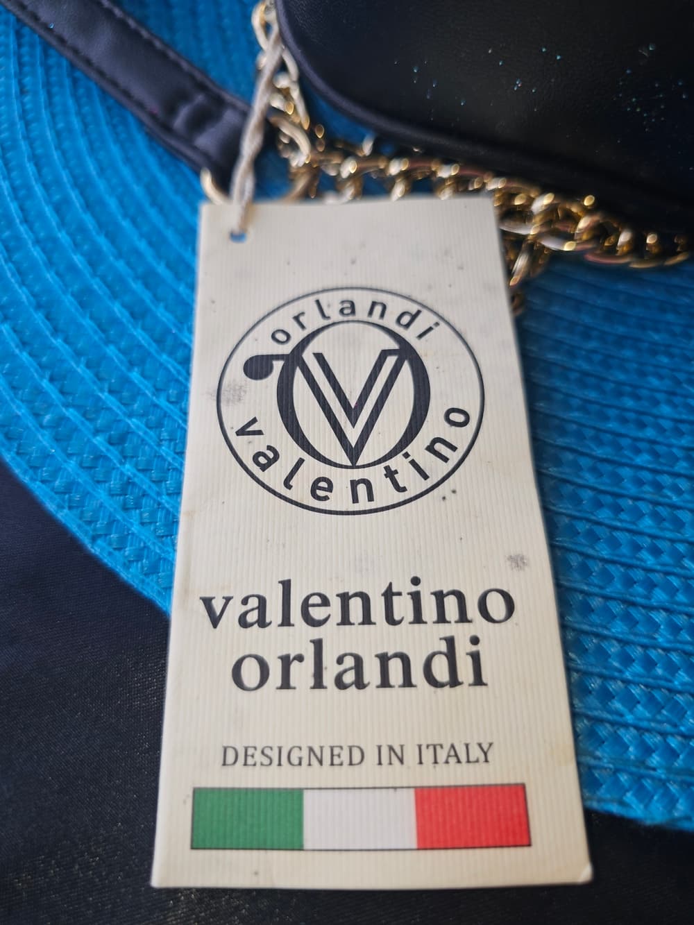 Valentino Quilted Black Crossbody Bag with Gold V Logo