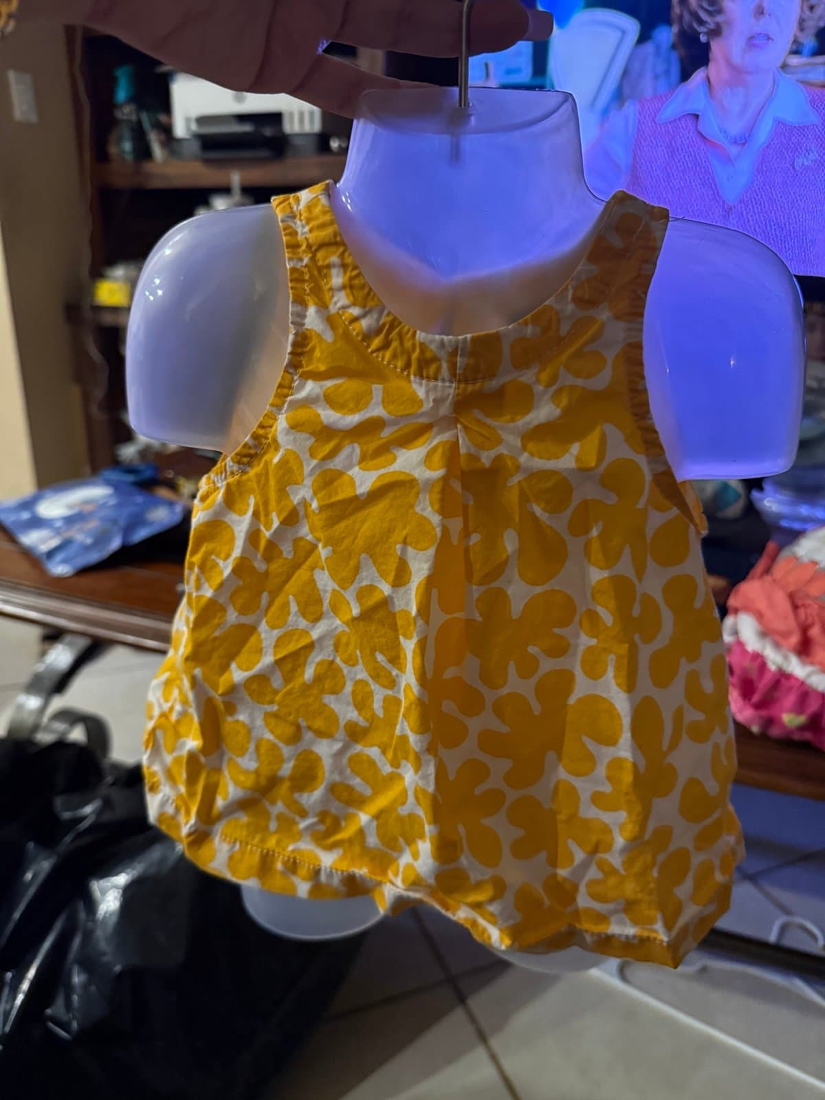 Colorful Penelope Mack dress. Has ruffled tiers. Colors are pink, orange, white,