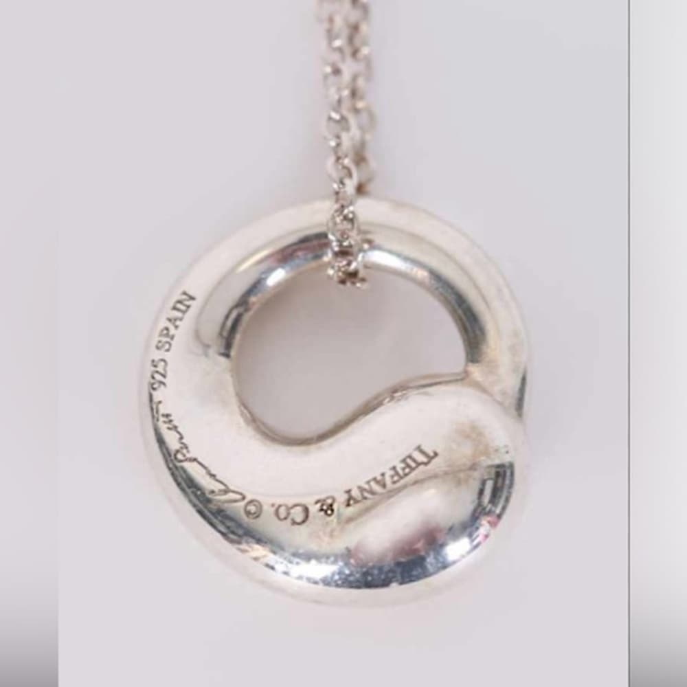 Tiffany & Co Circle pendant with 16” chain