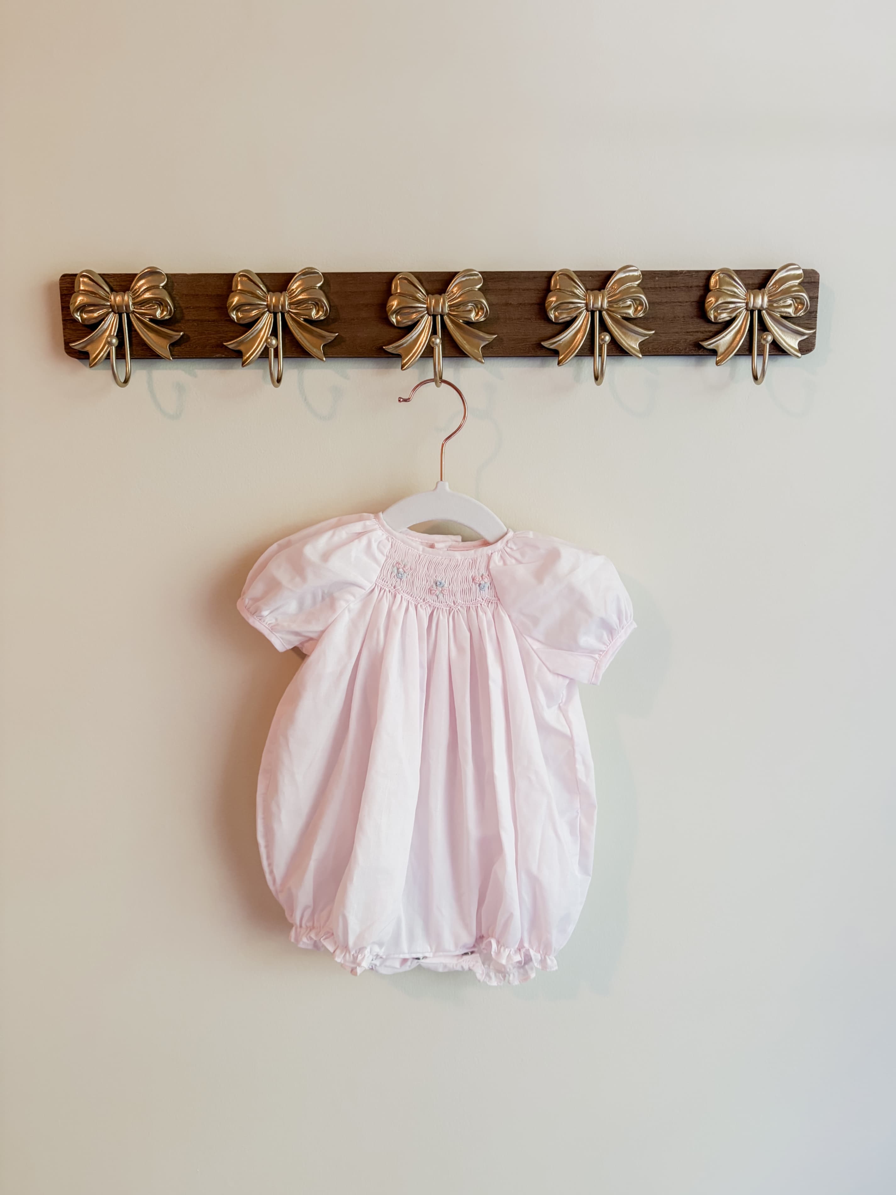 Petit Ami size newborn Pink Bubble Romper with Smocked Detail