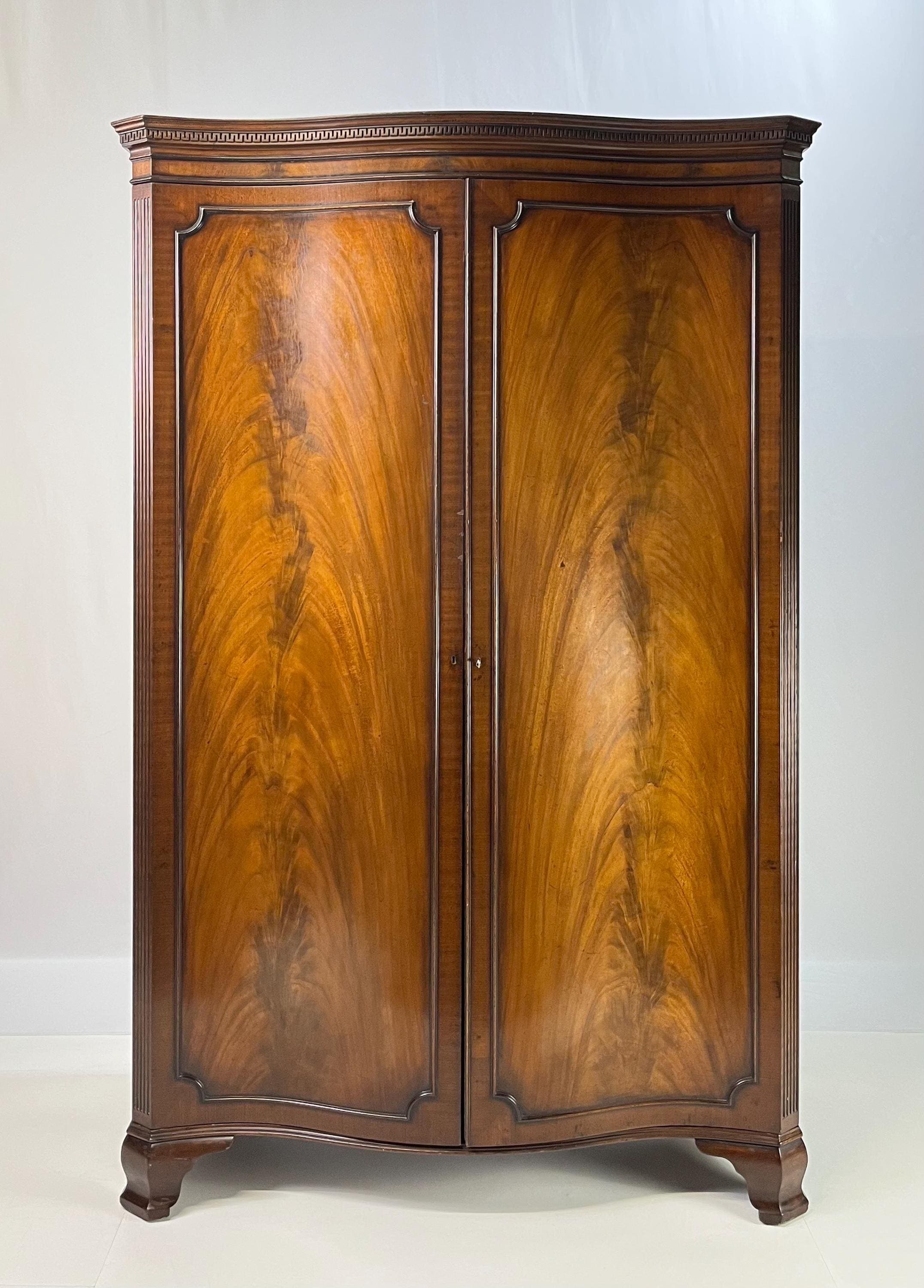Antique George III Style Flame Mahogany Serpentine Wardrobe
