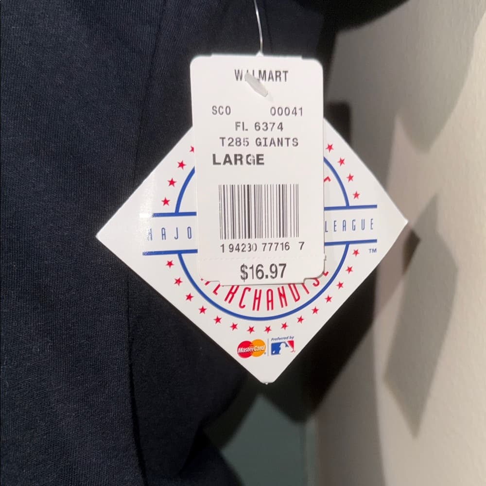 Genuine Merchandise Black Tee with Patriotic Logo