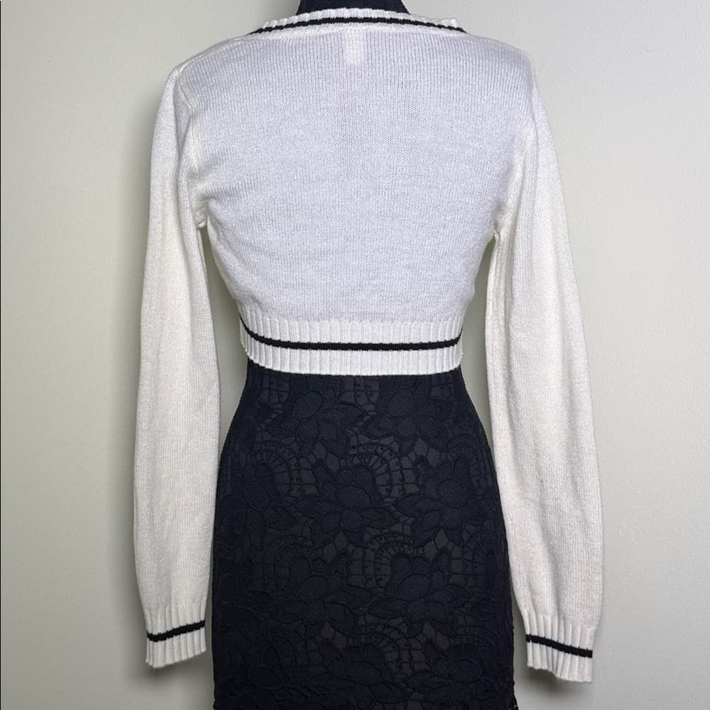 Divided White Cropped Sweater with Black Accents