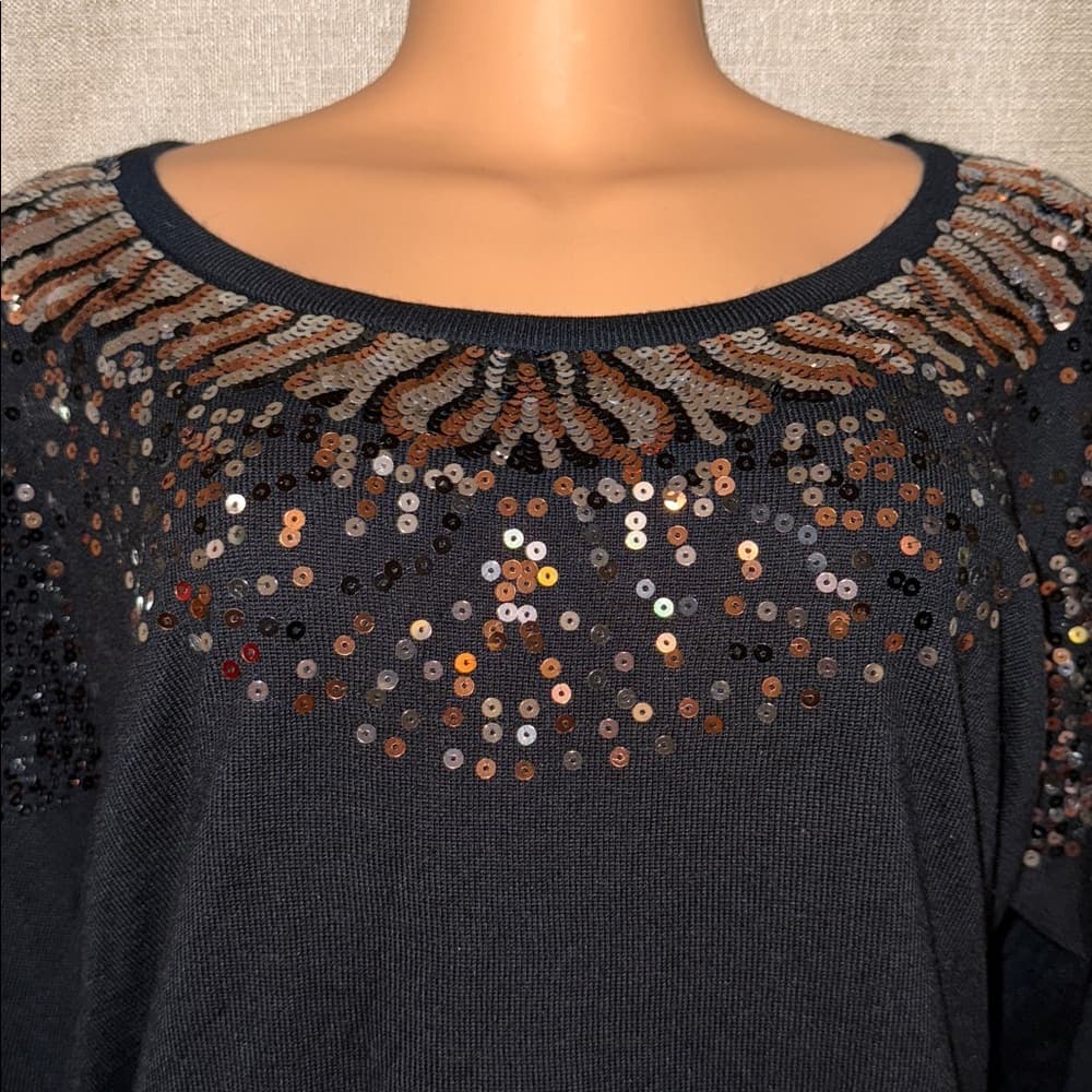 Black sweater with sequins embellishments