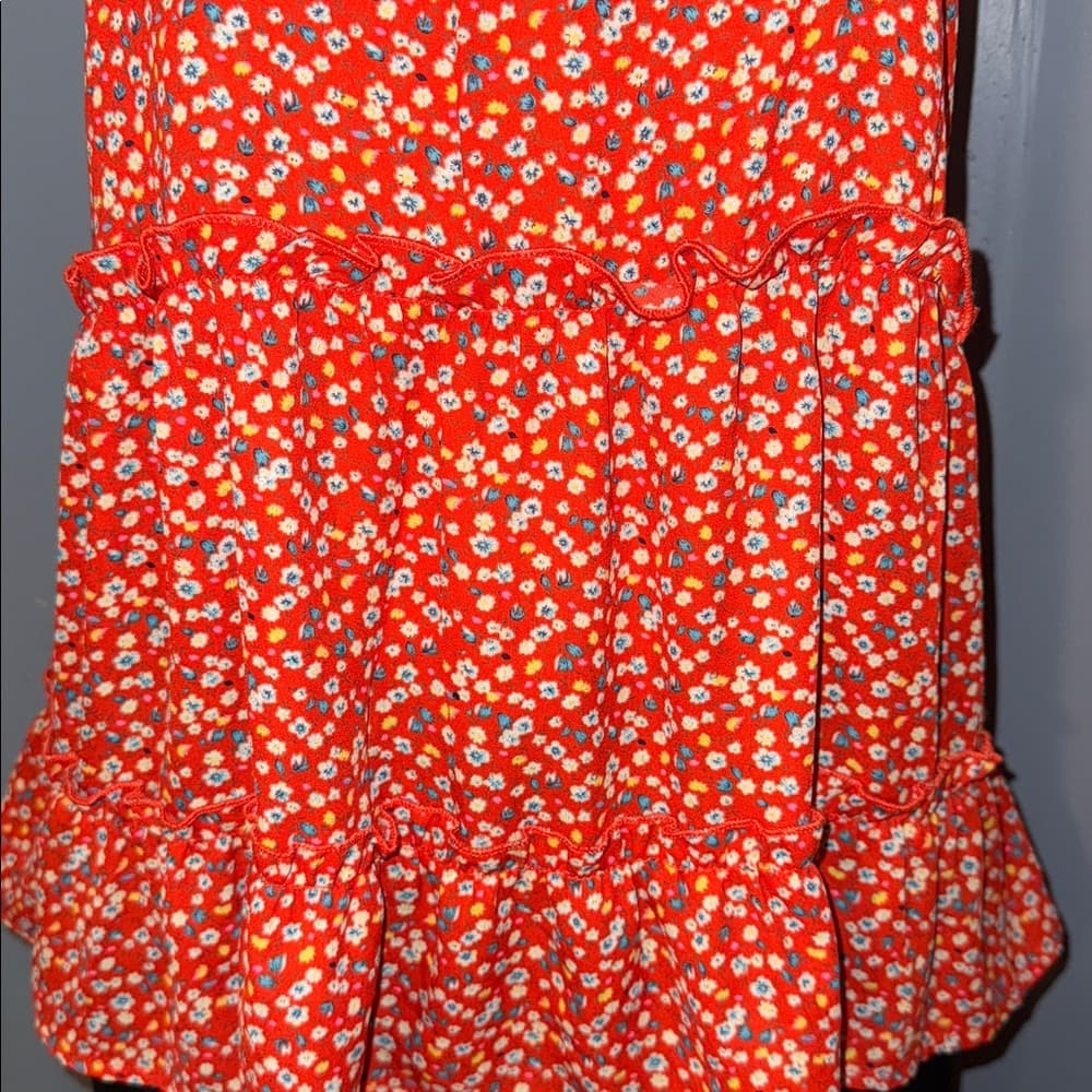 Sienna Sky Floral Tank Top With Ruffled Accents. Size medium.