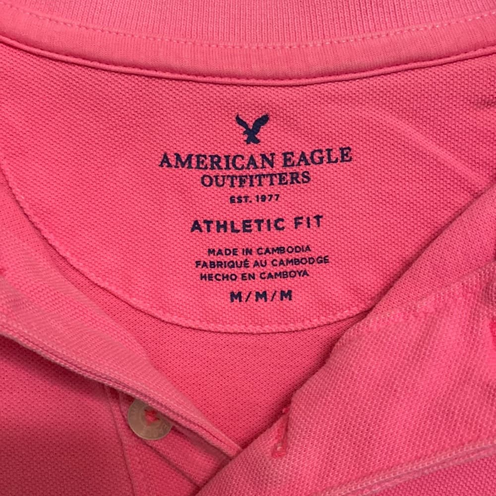 Pink athletic fit polo shirt*