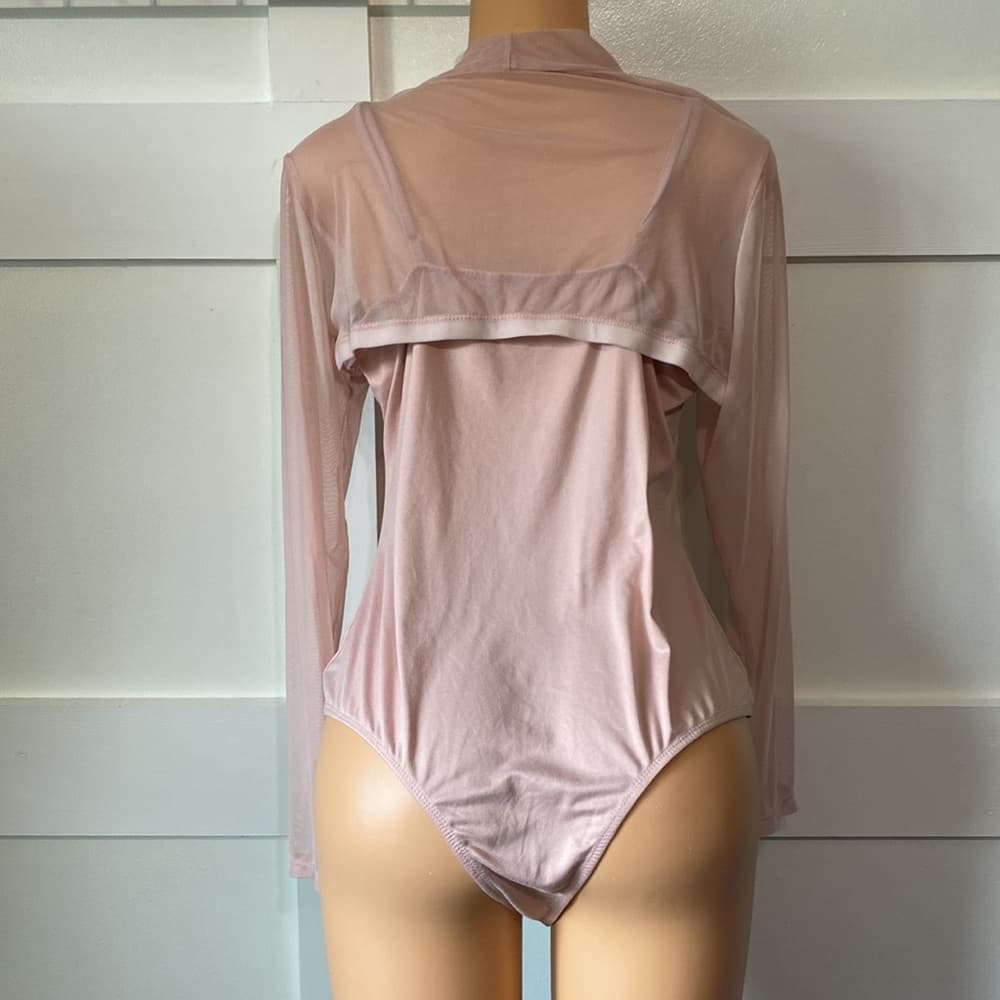 Curvy Girl Pink bodysuit with attached pink sheer long sleeve crop top