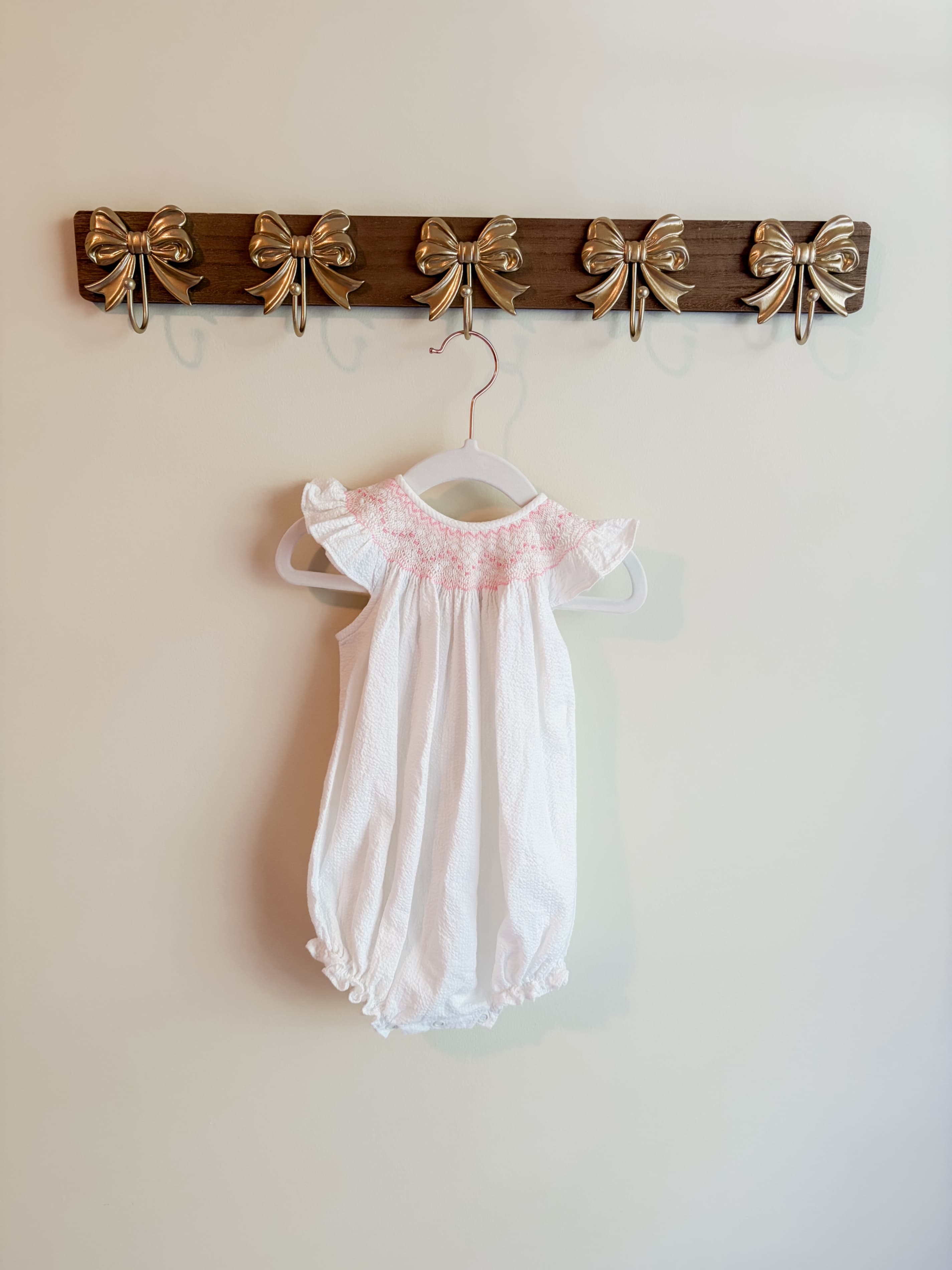 The Bailey Boys size 9 months girl White Romper with Pink Smocking Detail