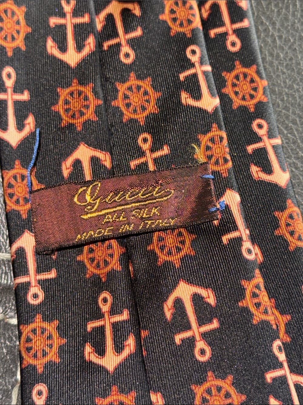 Gucci Black Tie with Orange Anchor & Wheel Motif vintage gem