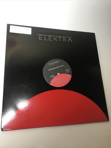 Grandmaster Flash GIRLS LOVE THE WAY HE SPINS 1985 Elektra 12" Single