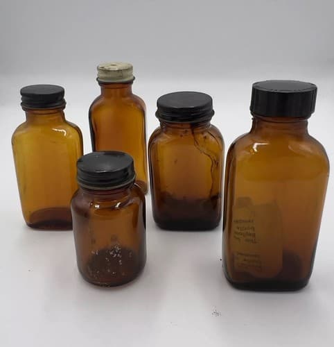 Lot of 5 Early Amber Apothecary Medicine Bottles with lids Early 1900's