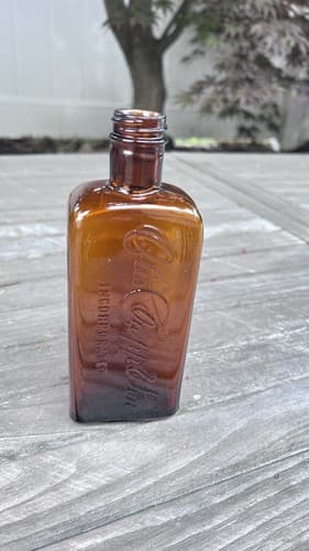 Antique Medicine Bottle Orange Amber Embossed Otis Clapp & Son Inc.