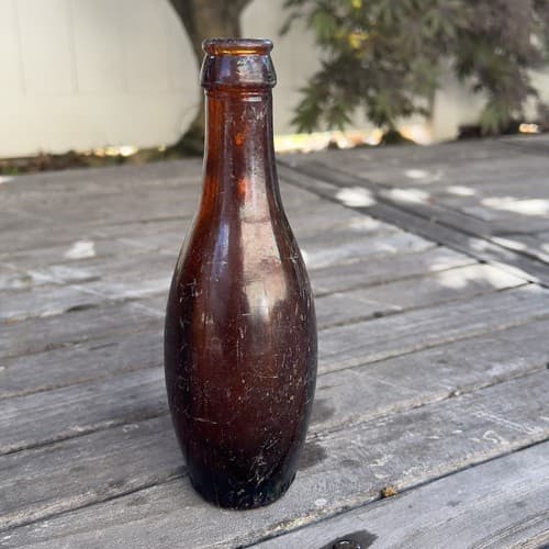Consolidated Bottling Newark NJ AMBER BOWLING PIN SHAPE SODA BOTTLE