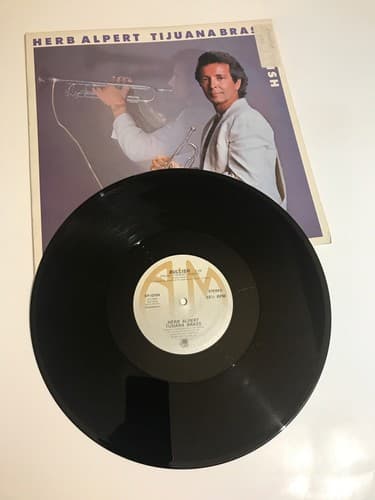 HERB ALPERT - TIJUANA BRASS - BULLISH - ORIENTAL EYES - 1983 - 45 RPM RECORD