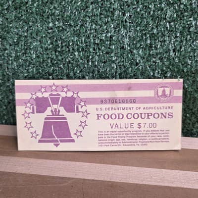 Value $7 book of US Dept of Agriculture Food Coupons Stamps Series