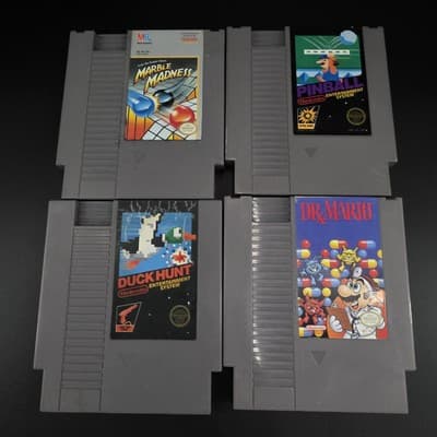 Lot Of 4 NES Cartridges Marble Madness Duck Hunt Pinball Dr Mario