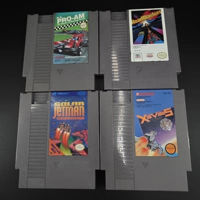 Lot Of 4 NES Cartridges Road Blaster Solar Jetman Xevious RC Pro Am