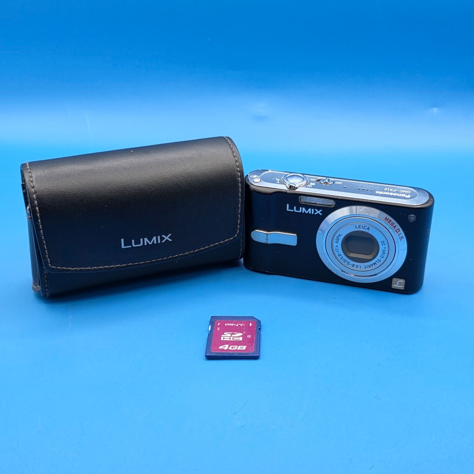 Panasonic Lumix DMC-FX12 7.2 MP Digital Compact Camera Black W/ CASE & 4GB