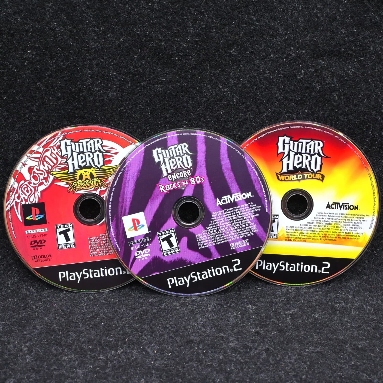 Guitar Hero Encore: Rocks the 80s Aerosmith & World Tour Ps2 Disc only