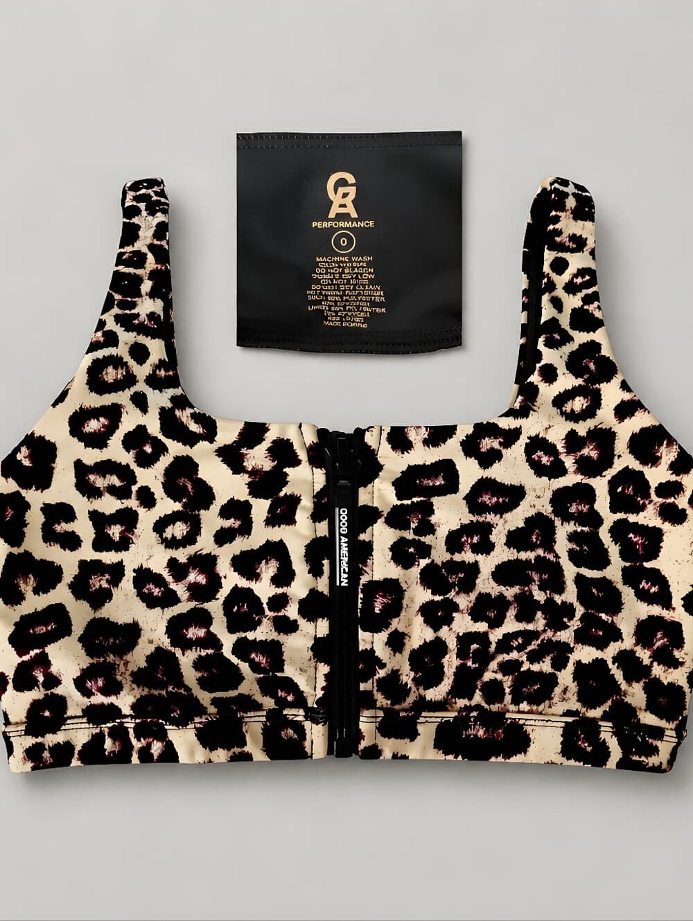 Good American Leopard Zip-Front Sports Bra in Cream, Black & Brown