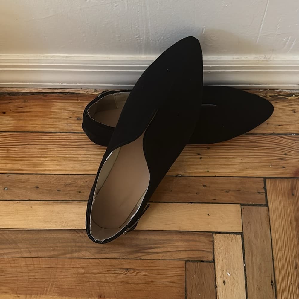 Black pointed flats