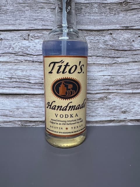 750 ML TITOS (CLEAR, ISLAND MANGO) HAND SANI - Regular