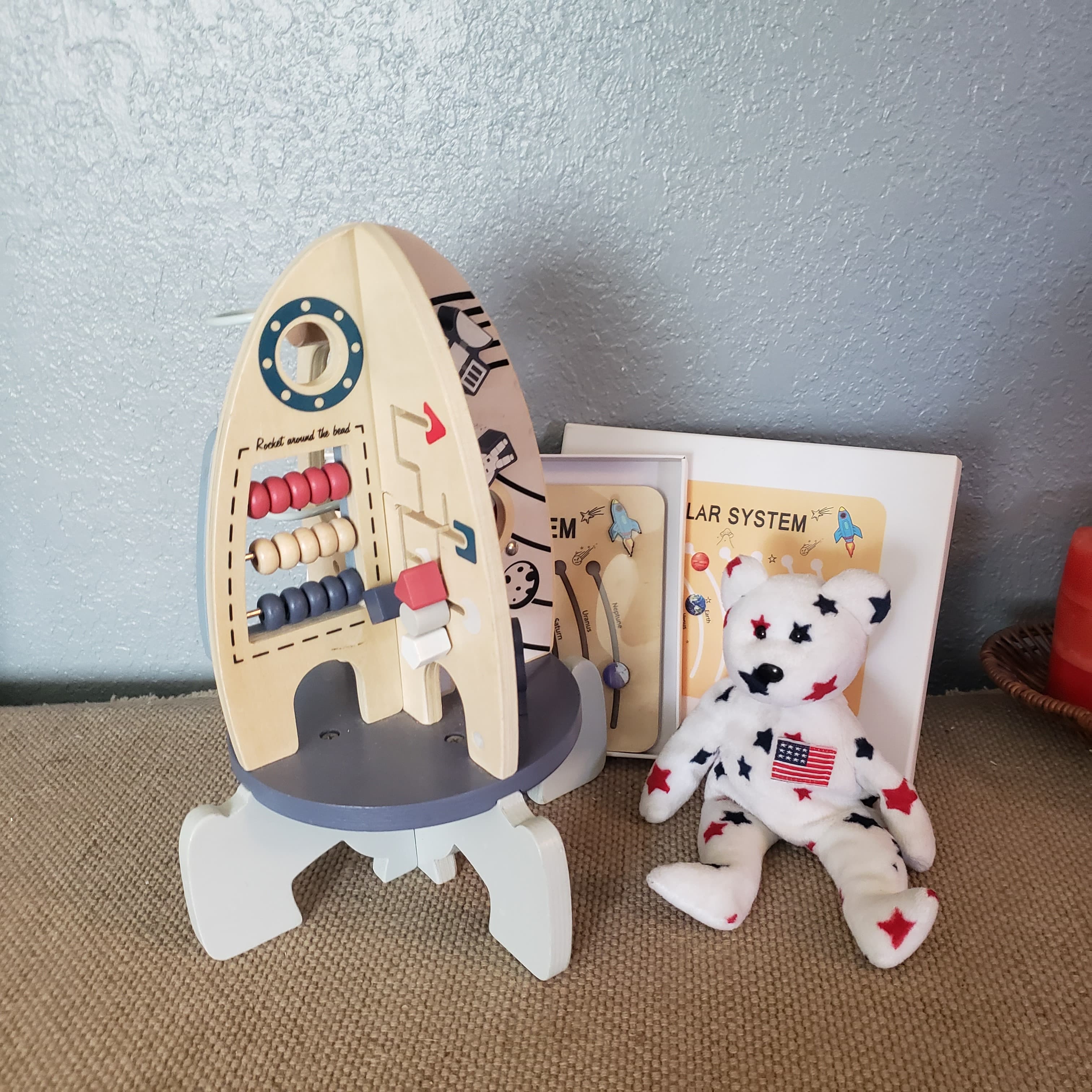 Wooden Rocket Activity Toy with Plush Bear and Solar System Set