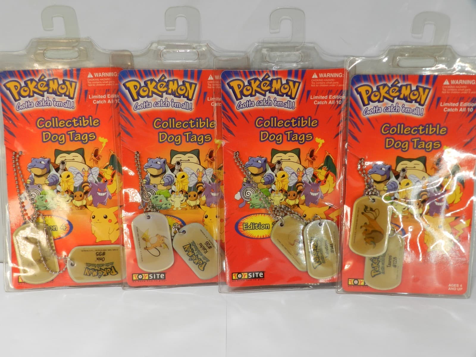 Vintage Lot Of 4 Pokémon Dog Tags 1999 (Onix , Raichu, Kabutops, Tauros) X69JJ