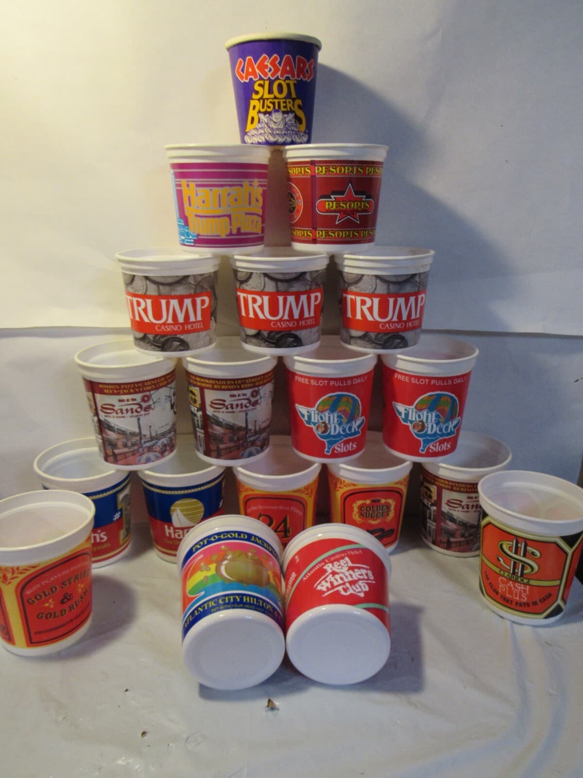LOT OF 19 Sands Harrah Trump Caesars Tropicana Casino Slot Coin Cups B48J