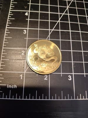 Disney Parks 50th Anniversary gold coin Aladdin Genie -new