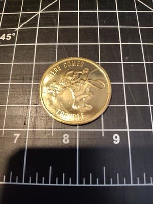 Disney Parks Gold Coin Here Comes Trouble Souvenir POTC Collectible