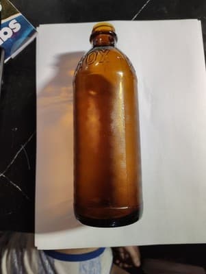 Antique Amber Clorox Bottle Glass Bottle 8"H x 3"D w/partial lid
