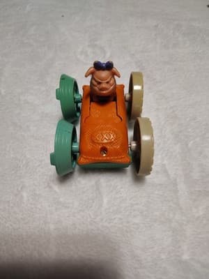 Vintage McDonald’s 101 Dalmatians Orange Green Pig Dog Flip Car Toy