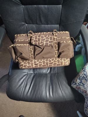 Giraffe print organizer with many Pockets and spaces to store Baby Items, Crafts