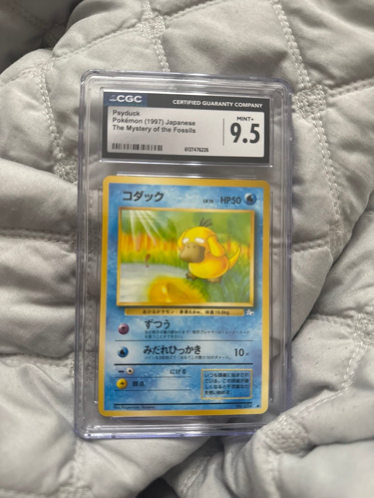 Psyduck fossil japanese cgc 9.5 gem mint