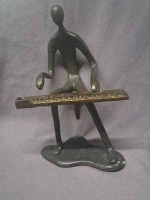 Danya B. Leisure Piano Playing Bronze Sculpture