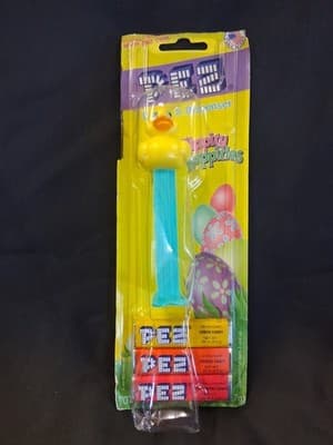 NEW SEALED PEZ Rubber Duck Ducky Apple TV SILO Relic Retired Candy Dispenser
