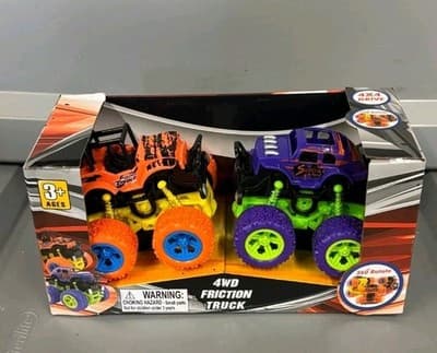 NIB Friction Monster Trucks Lot of 2 Purple Orange