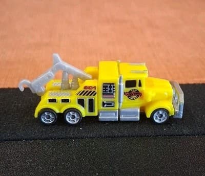 Hot Wheels Micro Planet Yellow Tow Truck "Tow Patrol" Loose 1997