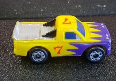1996 Micro Machines Race Truck #7 Yellow with Purple Flames - VIntage