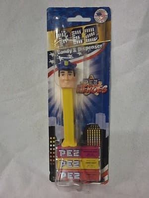 PEZ HEROES POLICEMAN OFFICER COP YELLOW STEM CANDY DISPENSER NEW ON CARD