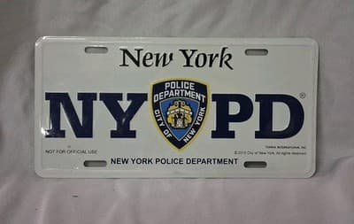 TORKIA INTERNATIONAL NY Souvenir License Plate NYPD White Sealed