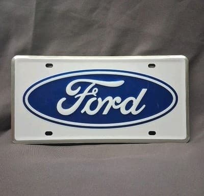 NOS FORD F100 F150 F250 WHITE WITH BLUE OVAL VANITY LICENSE PLATE