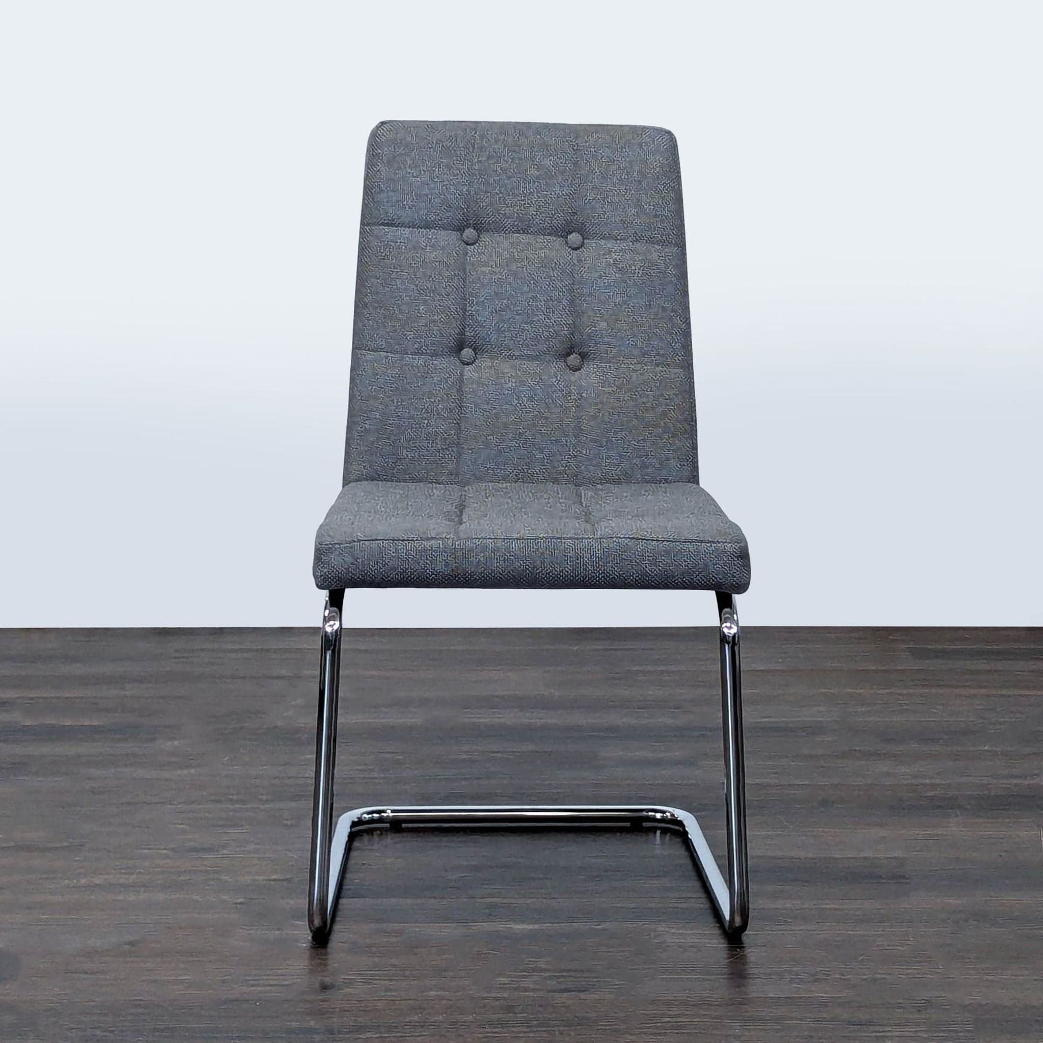 CB2 Button Tufted Dining Chair on a Metal Frame