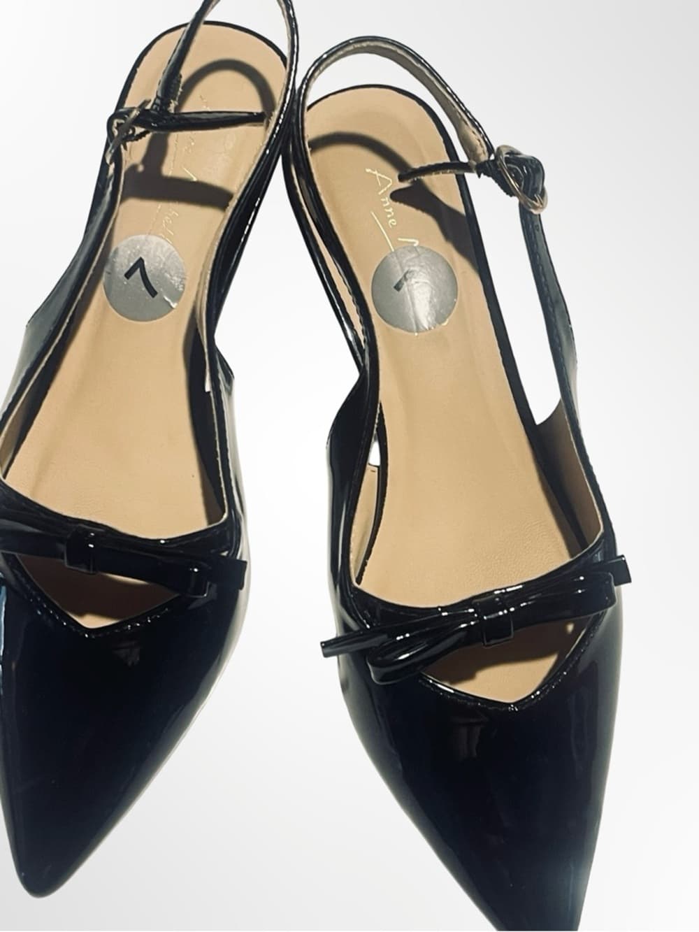 Ann Michelle Black Patent Pointed Toe Slingback heels with Bow in size 7